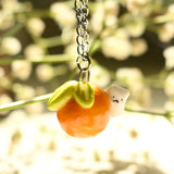 Cat on an Orange Necklace (Seconds)